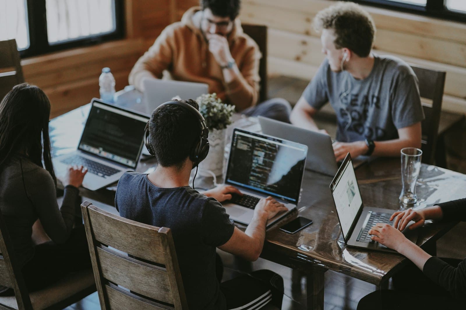 A team collaborating on AI-augmented workflows